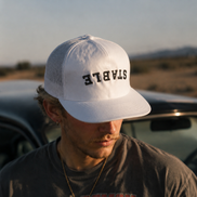 Inverted Stable Graphic Trucker Hats