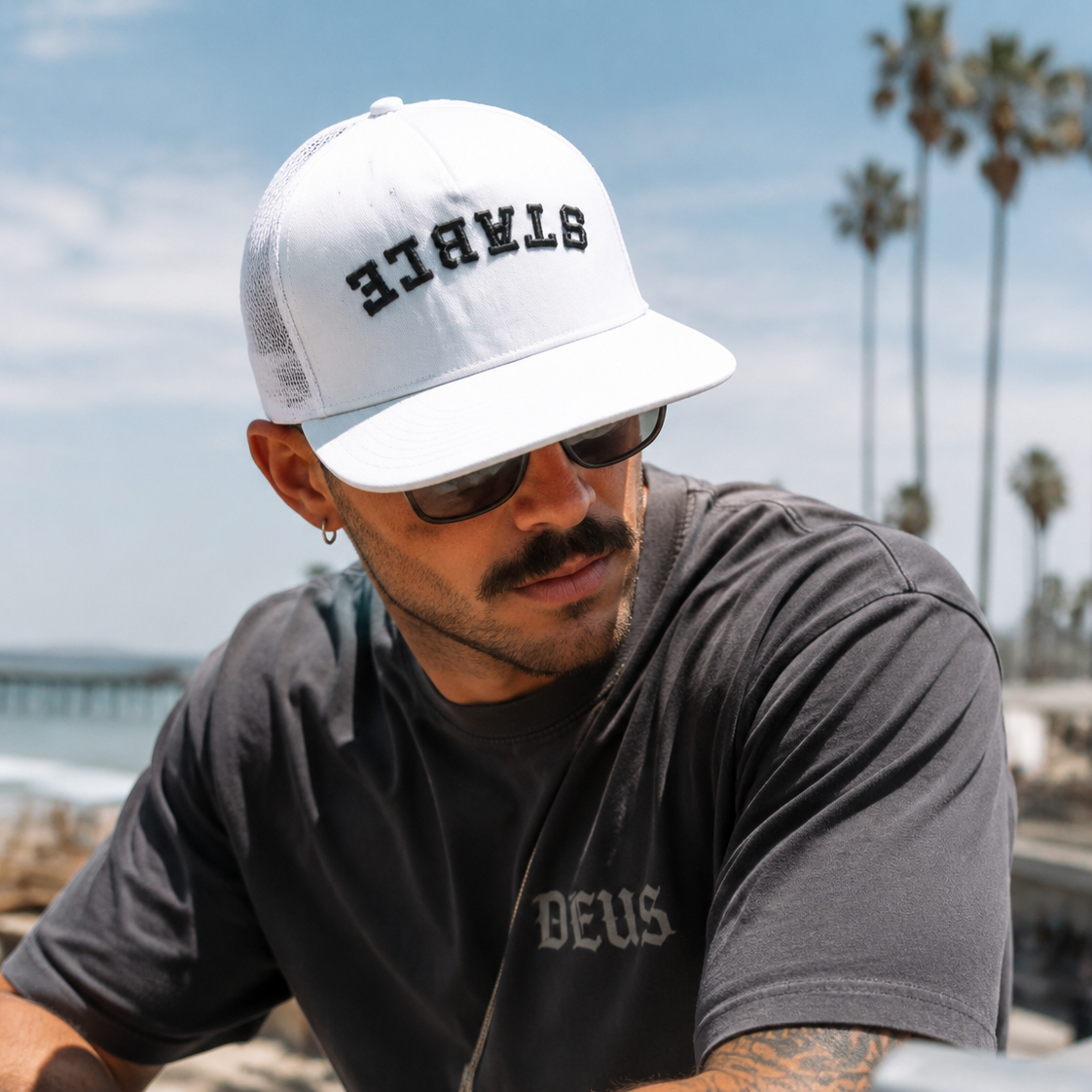 Inverted Stable Graphic Trucker Hats