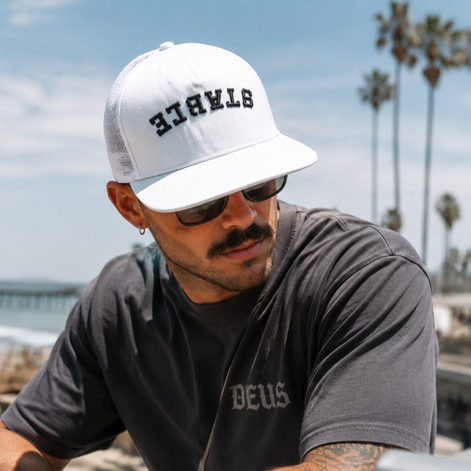 Inverted Stable Graphic Trucker Hats